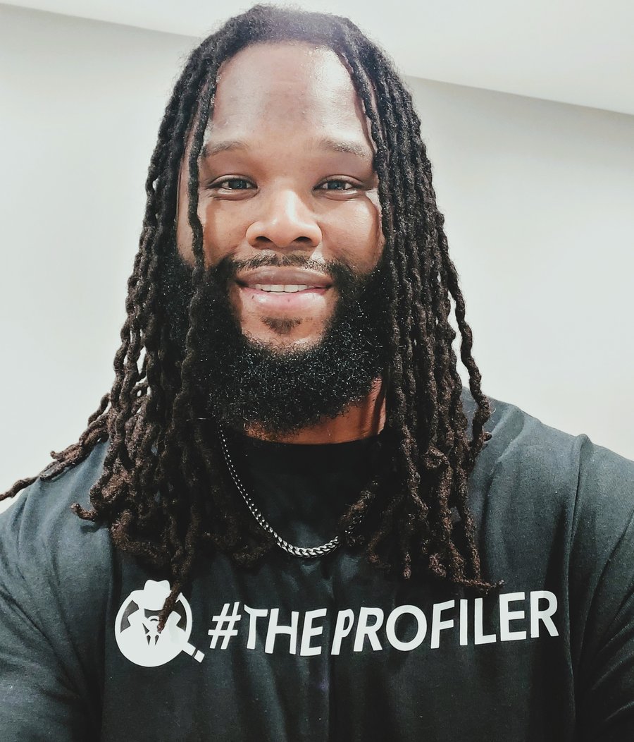 The Profiler—Signature Unisex Softstyle Tee